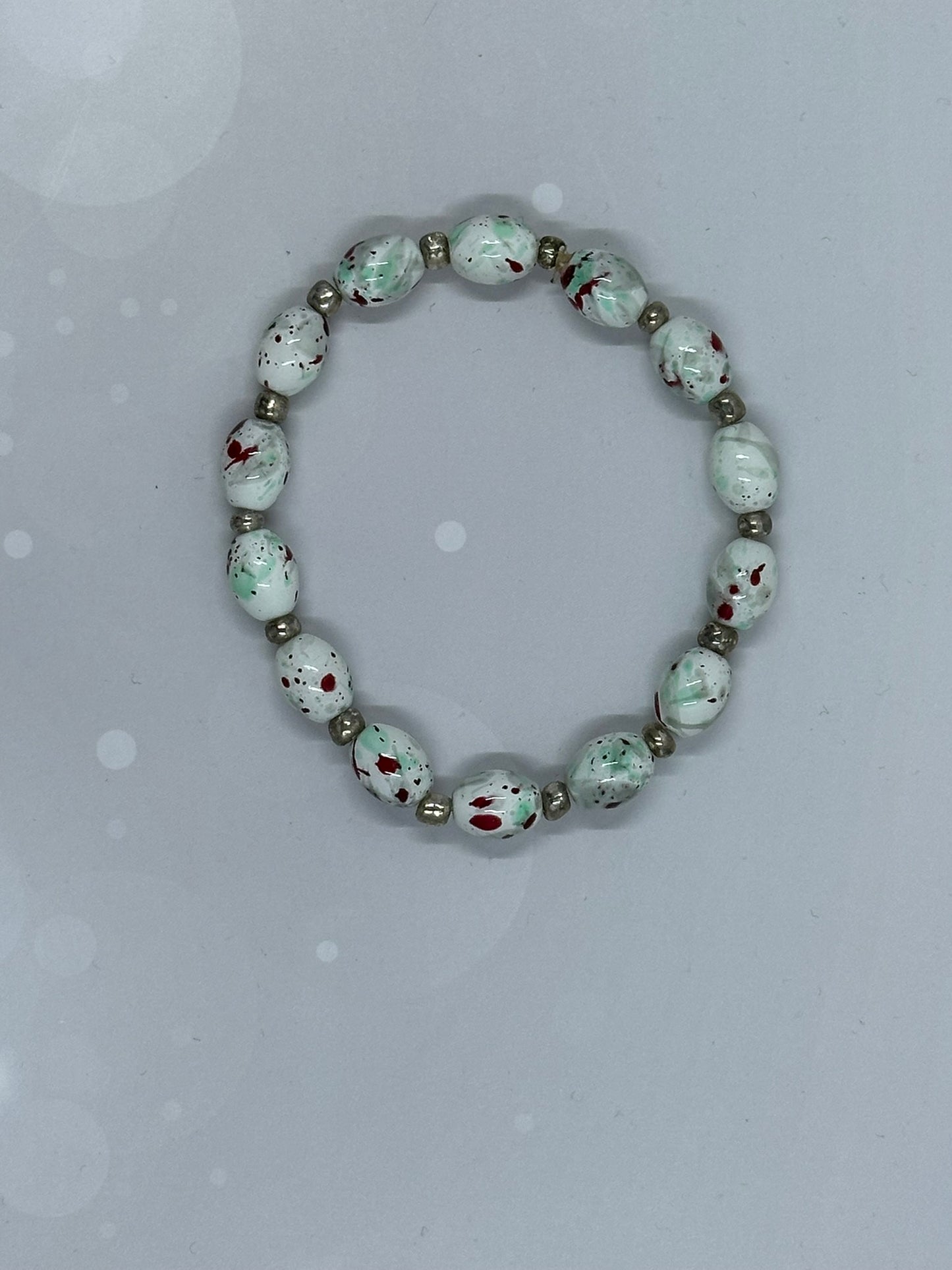Holiday Splatter Bead Bracelet – Handmade Red, Green & White Christmas Jewelry, Festive Stretch Bracelet