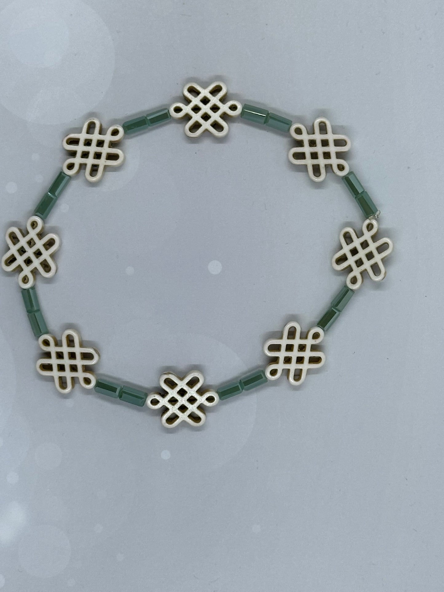 Green Beaded Endless Knot Bracelet – Symbol of Harmony and Balance
