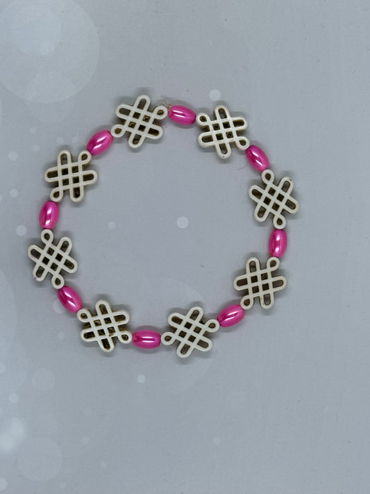 Ivory Endless Knot Bracelet with Pink Oval Beads – Handmade Stretch Jewelry